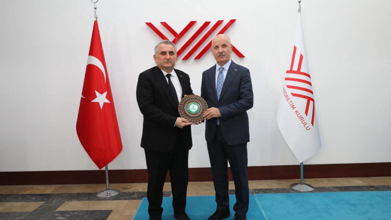 AÇÜ REKTÖRÜ AYDIN'DAN YÖK BAŞKANI ÖZVAR'A ZİYARET